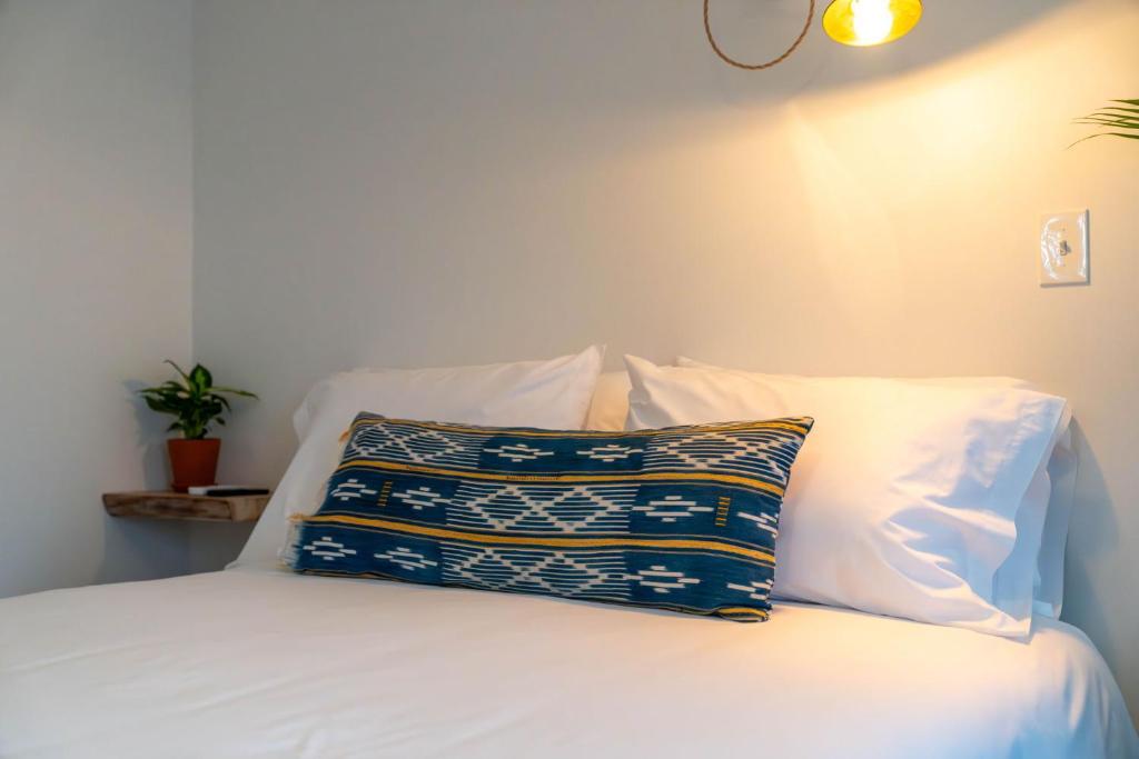 Postel nebo postele na pokoji v ubytování sisu, a boutique motel