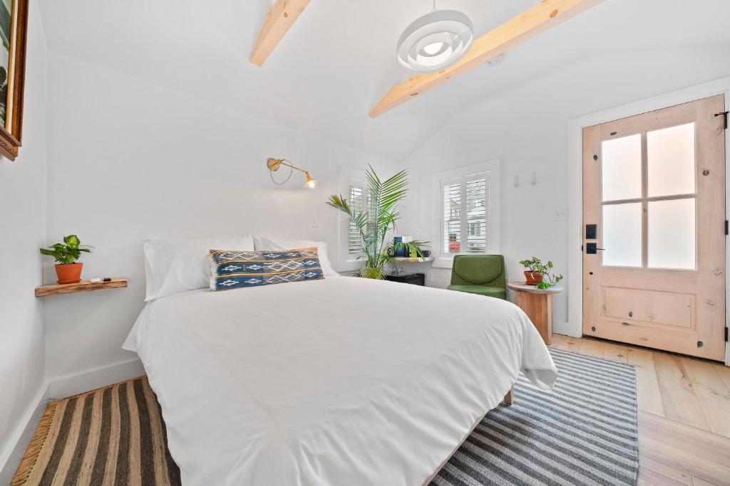 Postel nebo postele na pokoji v ubytování sisu, a boutique motel