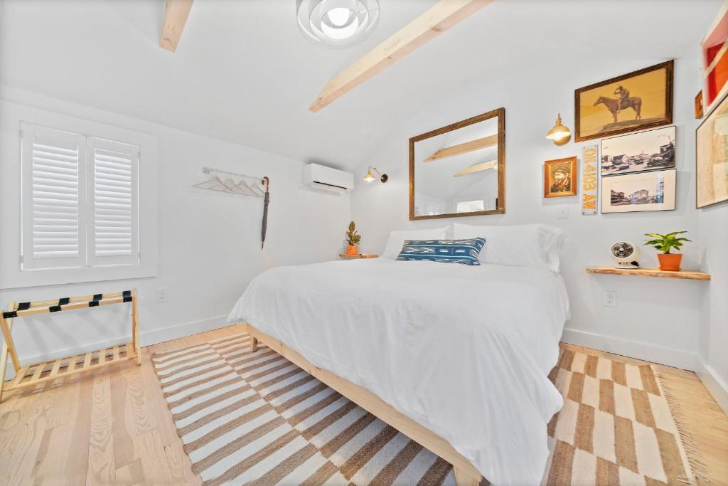Postel nebo postele na pokoji v ubytování sisu, a boutique motel