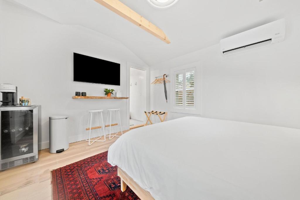 Postel nebo postele na pokoji v ubytování sisu, a boutique motel