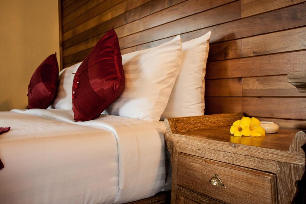 Кровать или кровати в номере Chaipura Resort