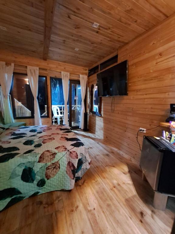 TV a/nebo společenská místnost v ubytování CABAÑA BLUE SKY