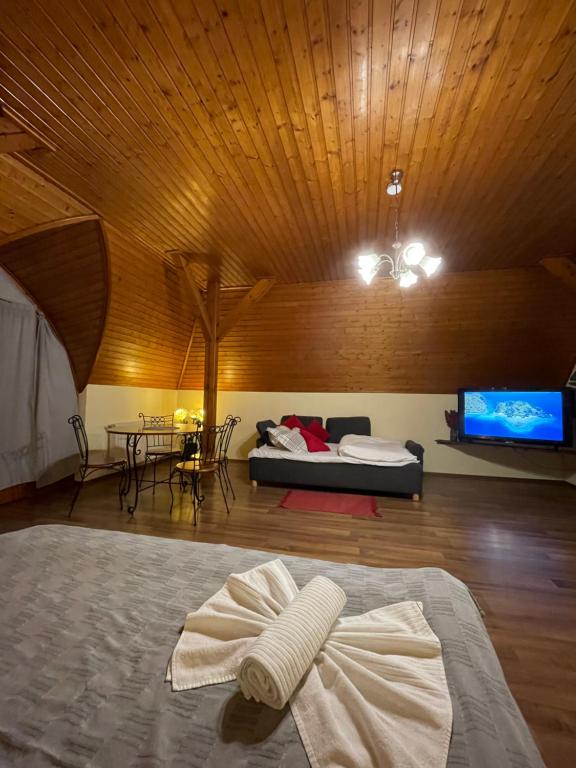 Postel nebo postele na pokoji v ubytování Marta Guest House