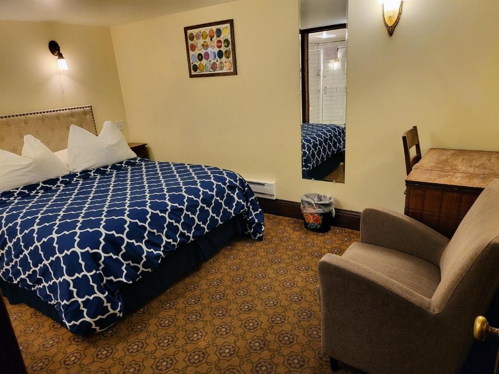Postel nebo postele na pokoji v ubytování Bluebird Guesthouse