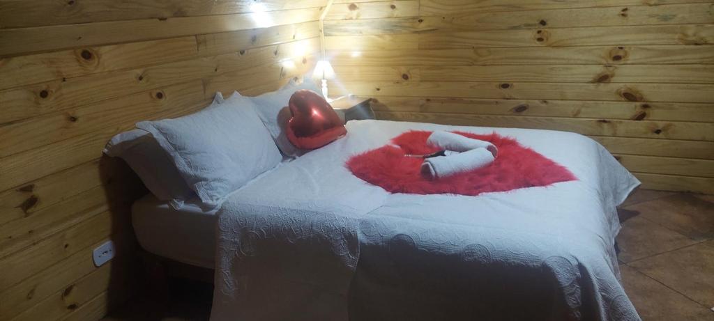 Postel nebo postele na pokoji v ubytování Chale com hidromassagem da Vick