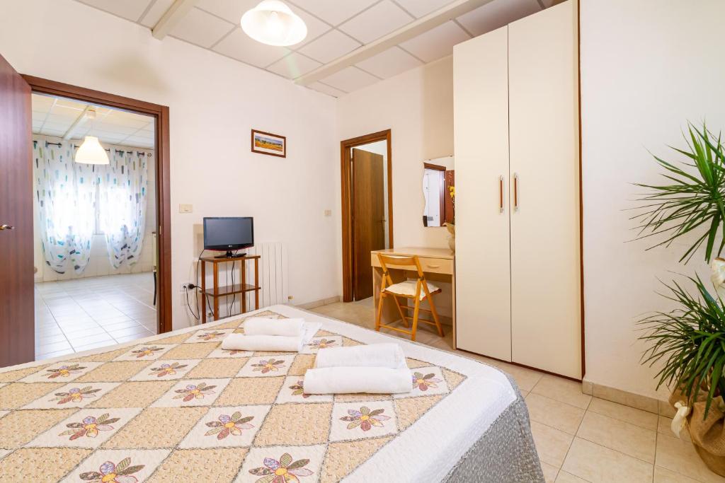 TV a/nebo společenská místnost v ubytování Agriturismo Fusini