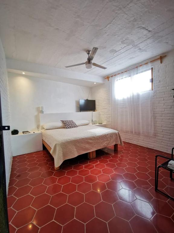 Postel nebo postele na pokoji v ubytování Casa Rey Sol Vallarta
