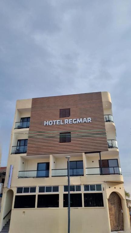 a hotel room building with the words hotel reformar on it at REGMAR Progreso Yucatán in Progreso