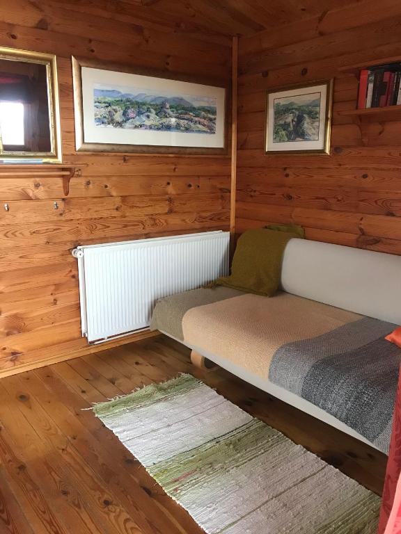 Postel nebo postele na pokoji v ubytování Kaldbaks-kot cottages