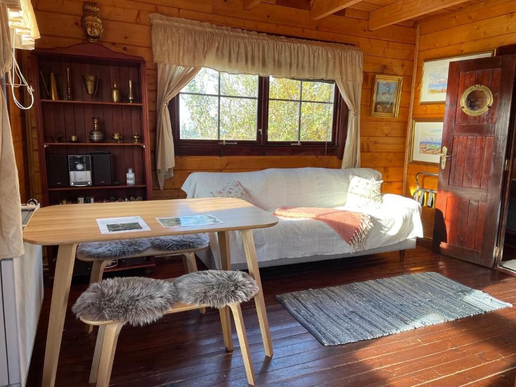 Posezení v ubytování Kaldbaks-kot cottages