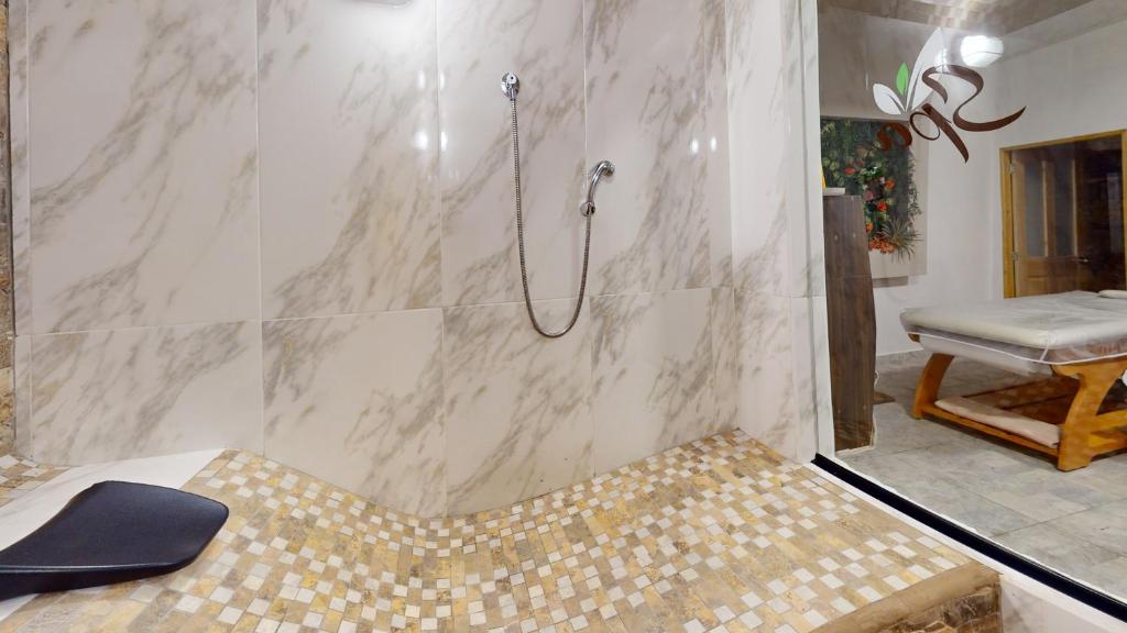 Postel nebo postele na pokoji v ubytování Hotel Villa Colonia