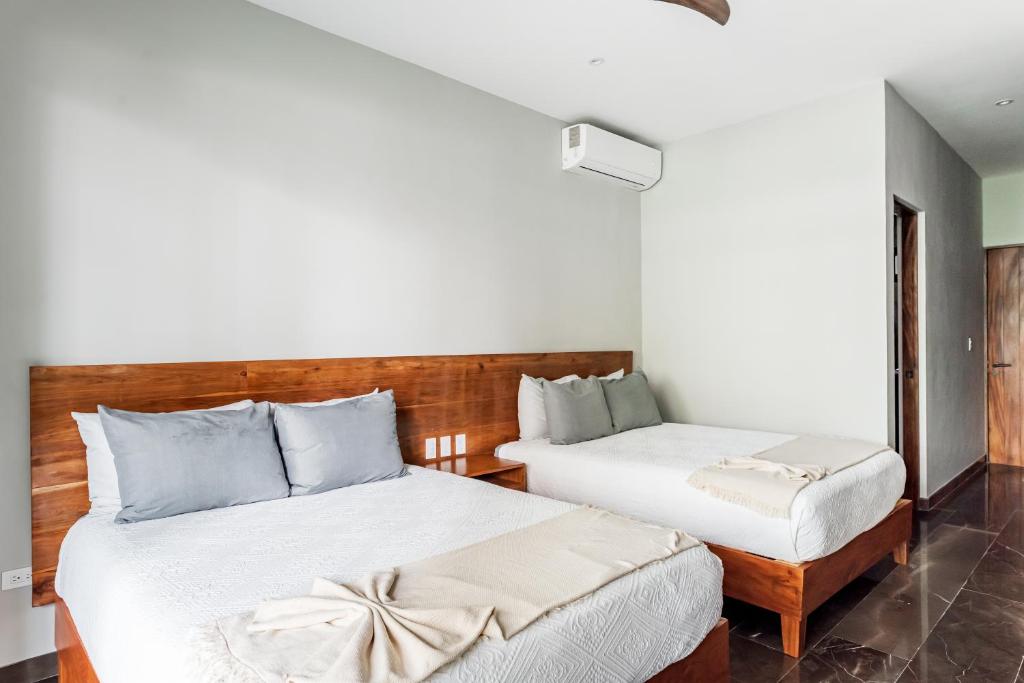 Arcadia Luxury Apartments in Aldea Zama, Tulum by Spot Rentals - Deluxe Queen Room With Two Queen Beds