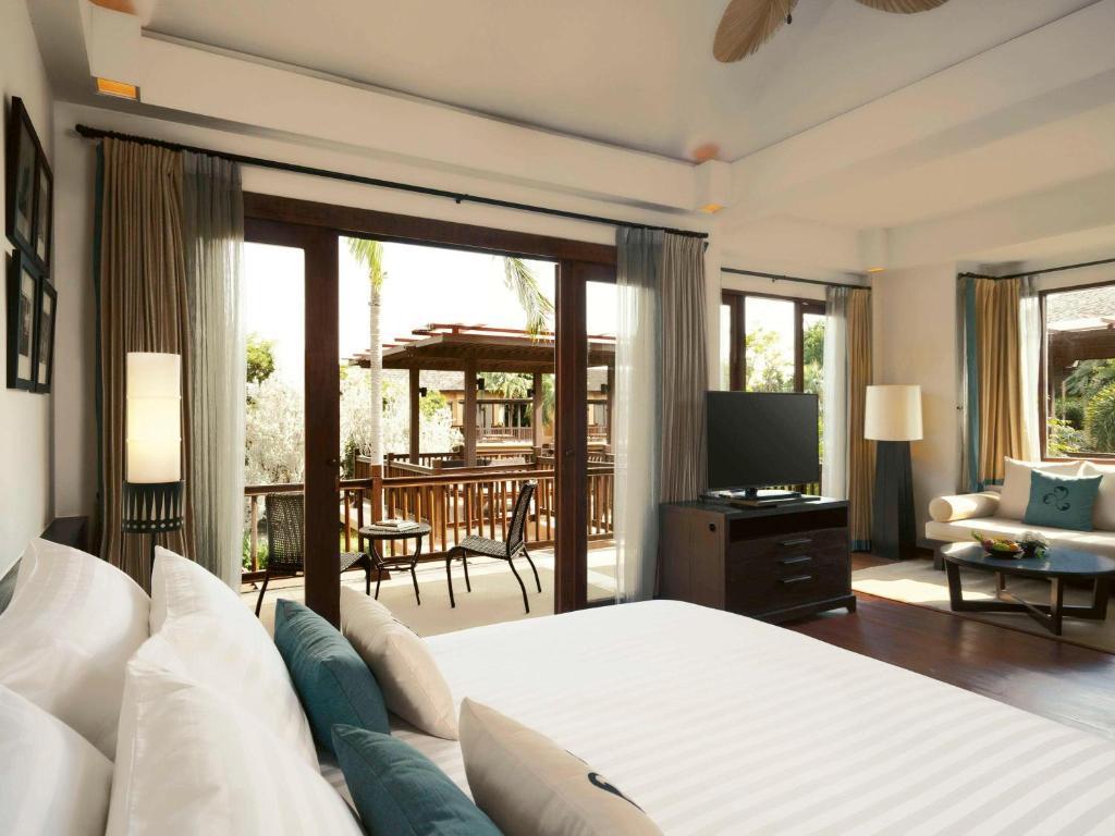 Postel nebo postele na pokoji v ubytování Mövenpick Asara Resort & Spa Hua Hin