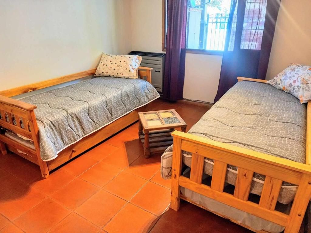 Ένα ή περισσότερα κρεβάτια σε δωμάτιο στο Apartamento céntrico 3 ambientes