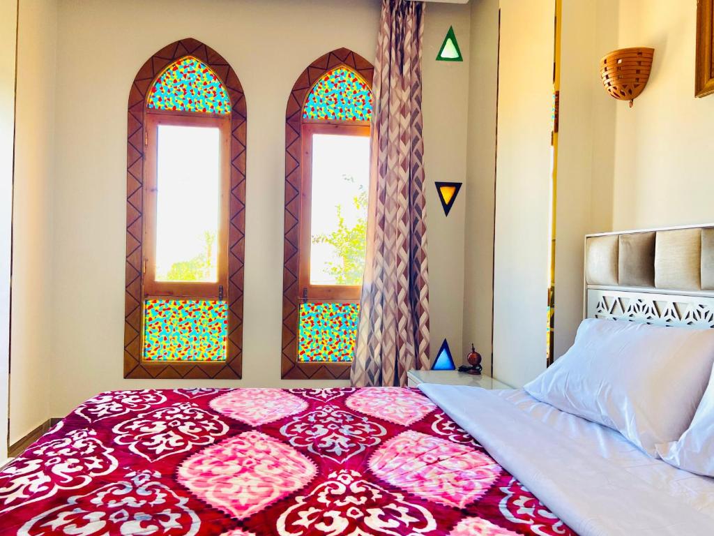 Postel nebo postele na pokoji v ubytování New Abu simbel Hotel & Restaurant