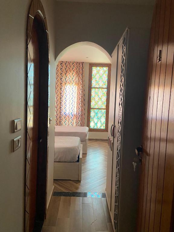 Postel nebo postele na pokoji v ubytování New Abu simbel Hotel & Restaurant