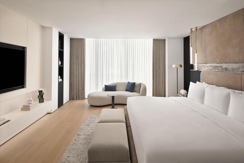 TV a/nebo společenská místnost v ubytování Sheraton Grand Hotel, Dubai
