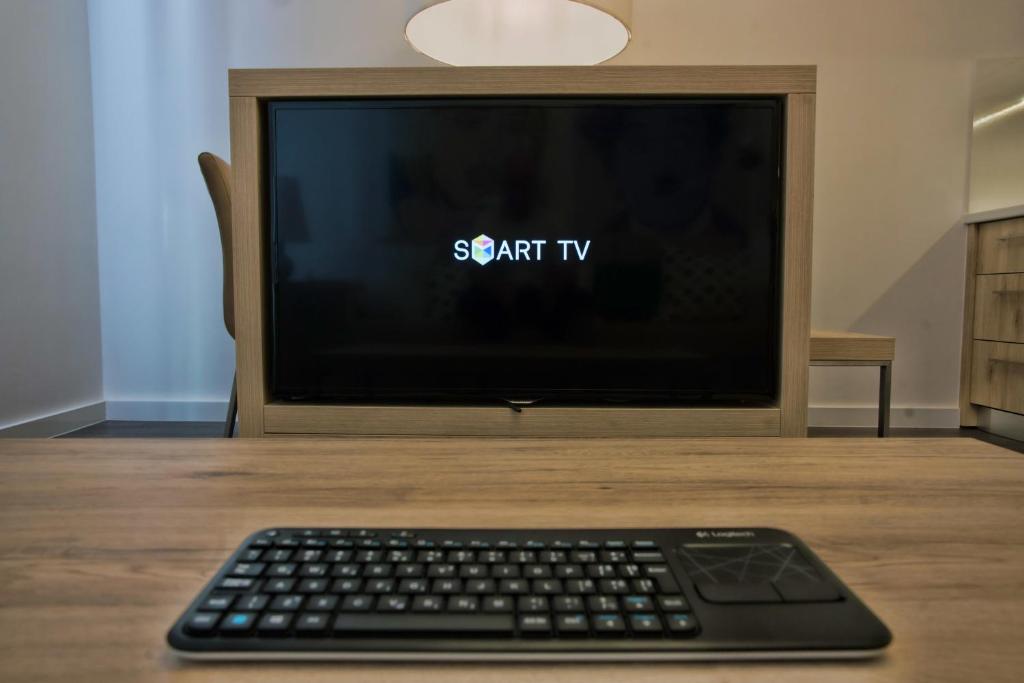 TV a/nebo společenská místnost v ubytování CASA V BENCUN Luxury Apartments