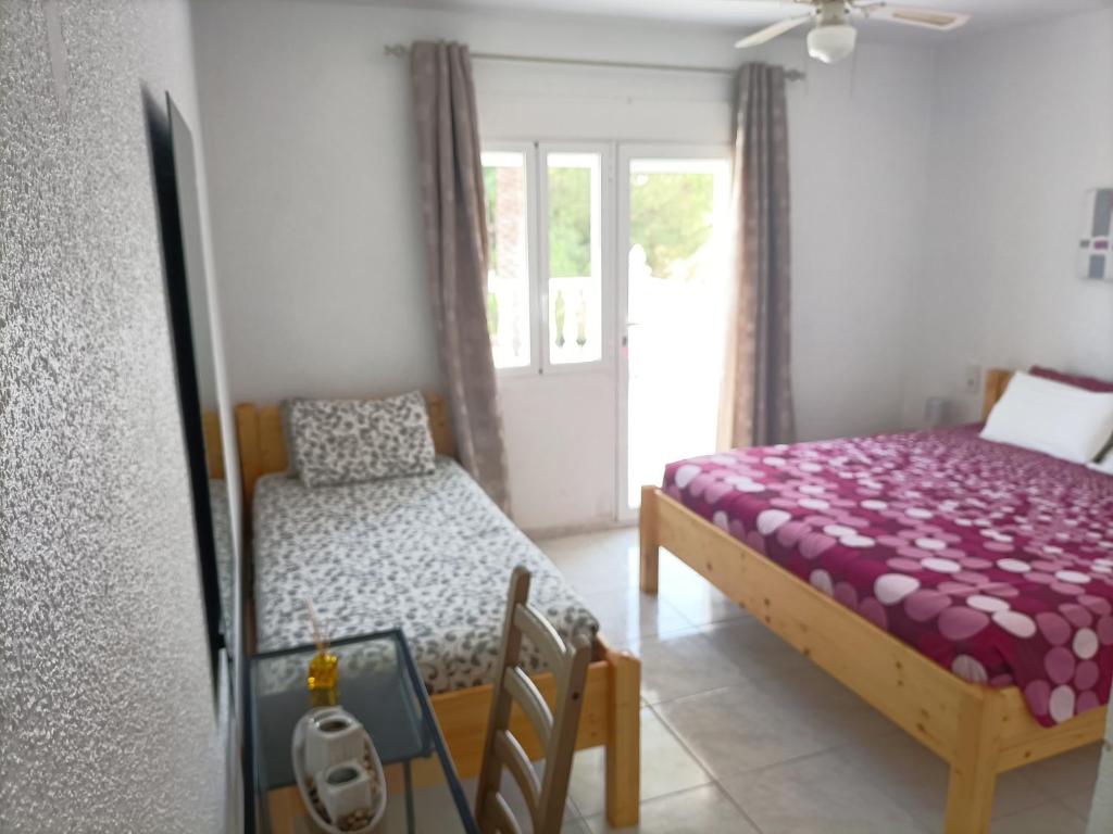 Postel nebo postele na pokoji v ubytování Villa Luxueuse HIVA OA à 3 min à pied de la plage
