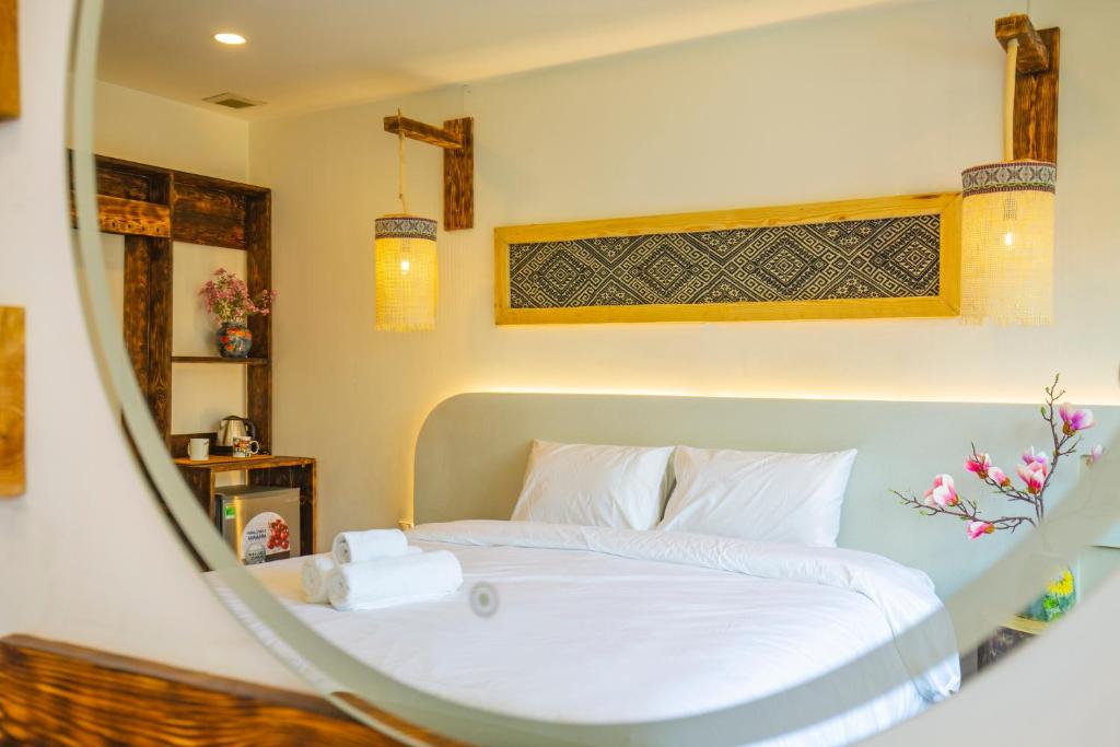 Postel nebo postele na pokoji v ubytování Mimosa Homestay Hanoi