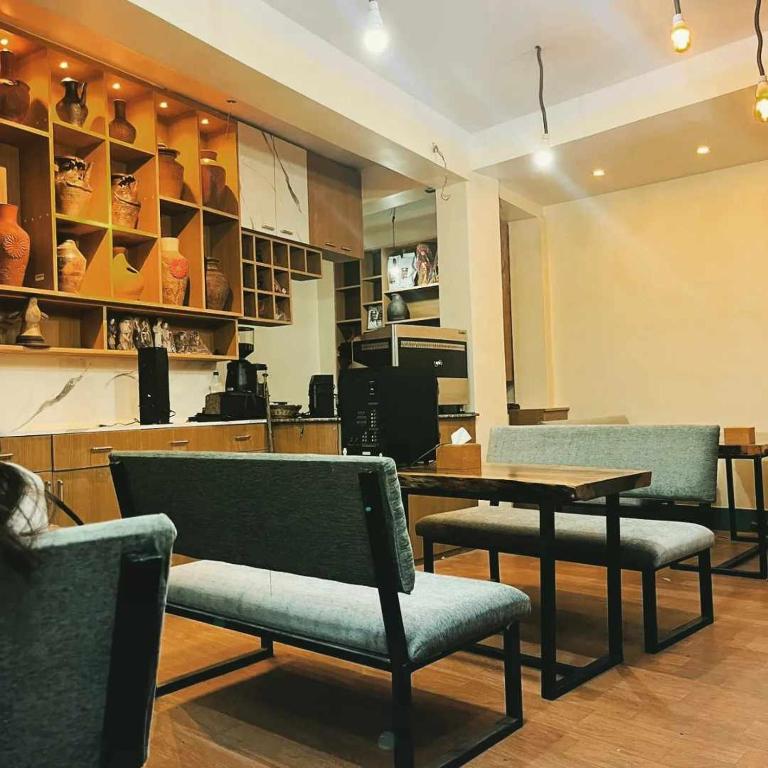 Kuchyň nebo kuchyňský kout v ubytování Cosy Hotel
