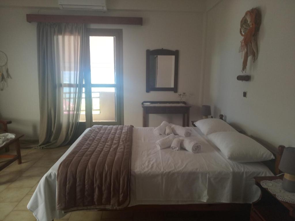 Ein Bett oder Betten in einem Zimmer der Unterkunft Buganvilla Sea View apts