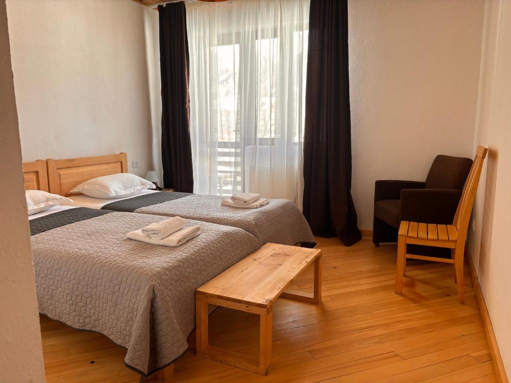 Postel nebo postele na pokoji v ubytování Beko’s garden Inn