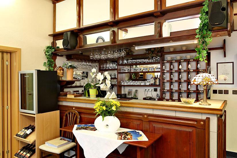 Kuchyň nebo kuchyňský kout v ubytování HOTEL RAJSKY