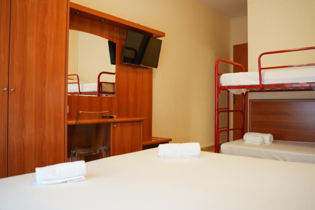 Posteľ alebo postele v izbe v ubytovaní Hotel Regent