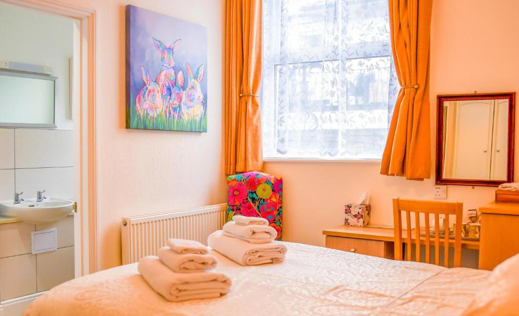 Postel nebo postele na pokoji v ubytování Grange Bank House