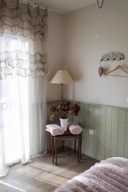 Postel nebo postele na pokoji v ubytování Le Petit Jardin, Gîte en baie de Somme
