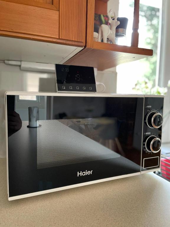 Kuchyň nebo kuchyňský kout v ubytování NOER apartman