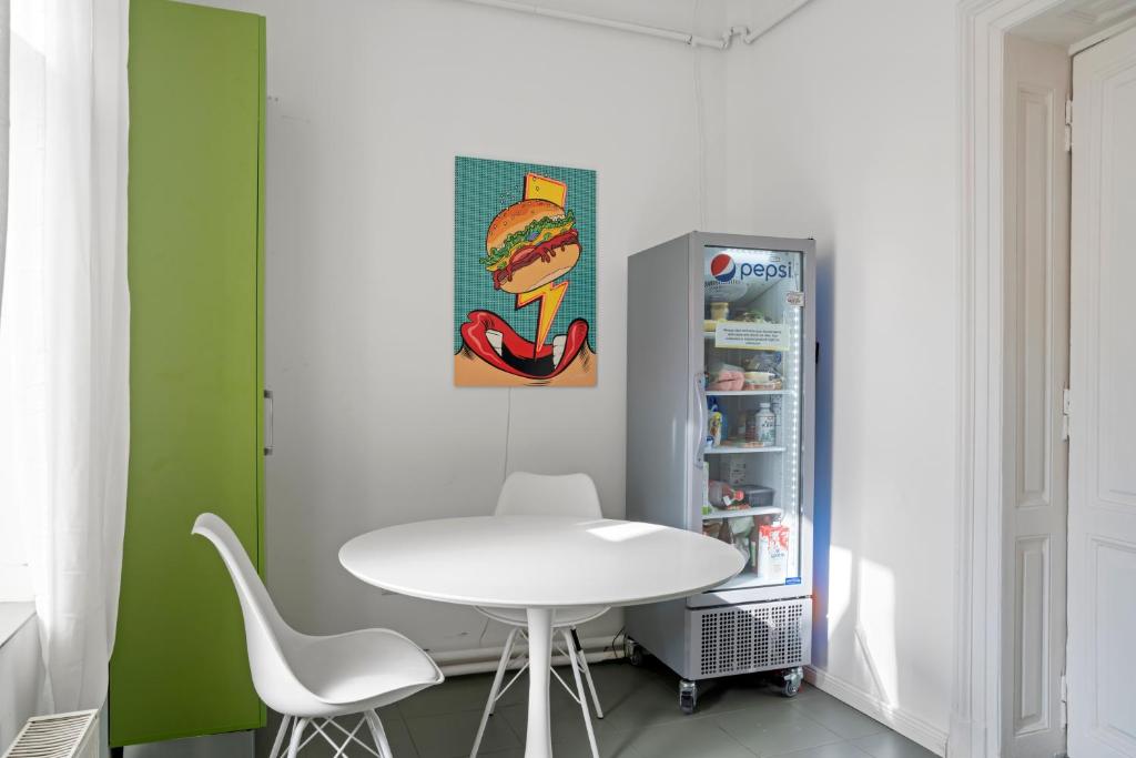 Kuchyň nebo kuchyňský kout v ubytování Nest Boutique Hostel