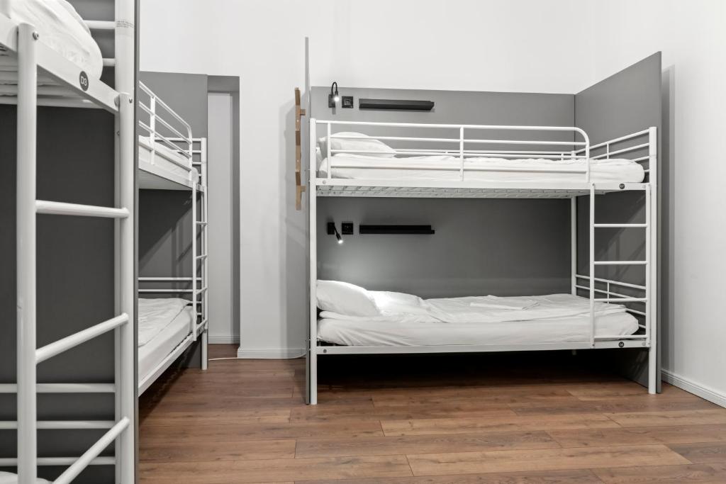 Postel nebo postele na pokoji v ubytování Nest Boutique Hostel