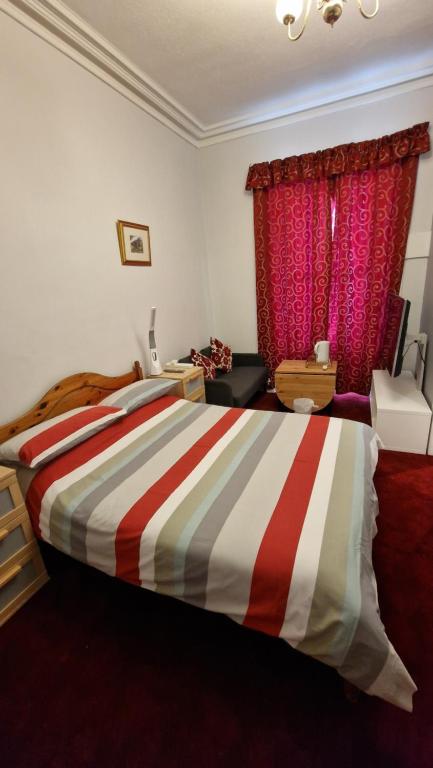 Postel nebo postele na pokoji v ubytování Mackenzie Guest house