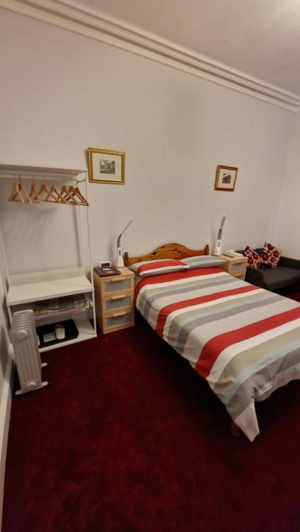 Postel nebo postele na pokoji v ubytování Mackenzie Guest house