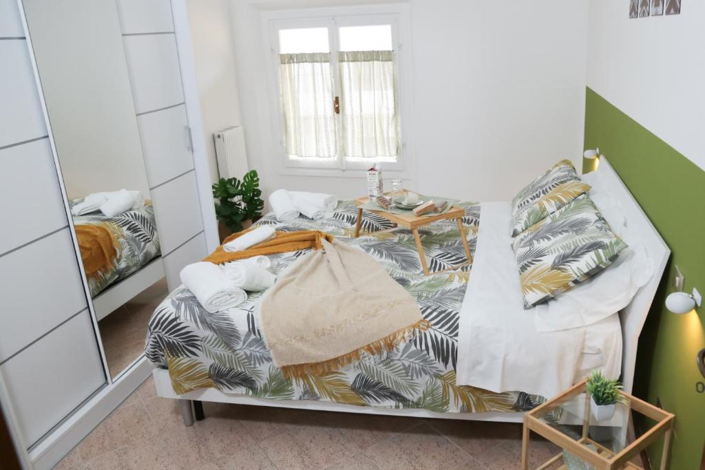 Кровать или кровати в номере Guest House Fontanesi