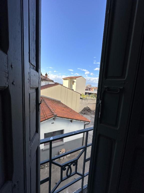 a view from an open door of a balcony at Charmant Studio avec Balcon in Perpignan