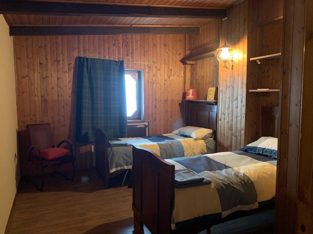 Postel nebo postele na pokoji v ubytování Bielmonte Appartamenti