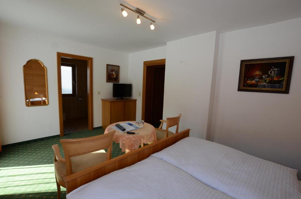 Postel nebo postele na pokoji v ubytování Haus Monika und Haus Claudia