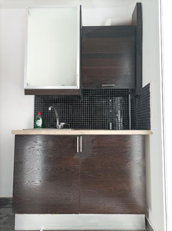 A kitchen or kitchenette at Myron Apartments