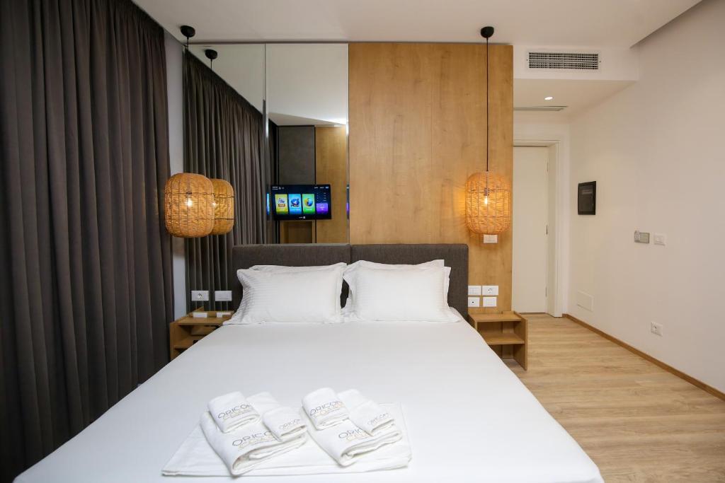 Ein Bett oder Betten in einem Zimmer der Unterkunft Oricon Coast Luxury Resort