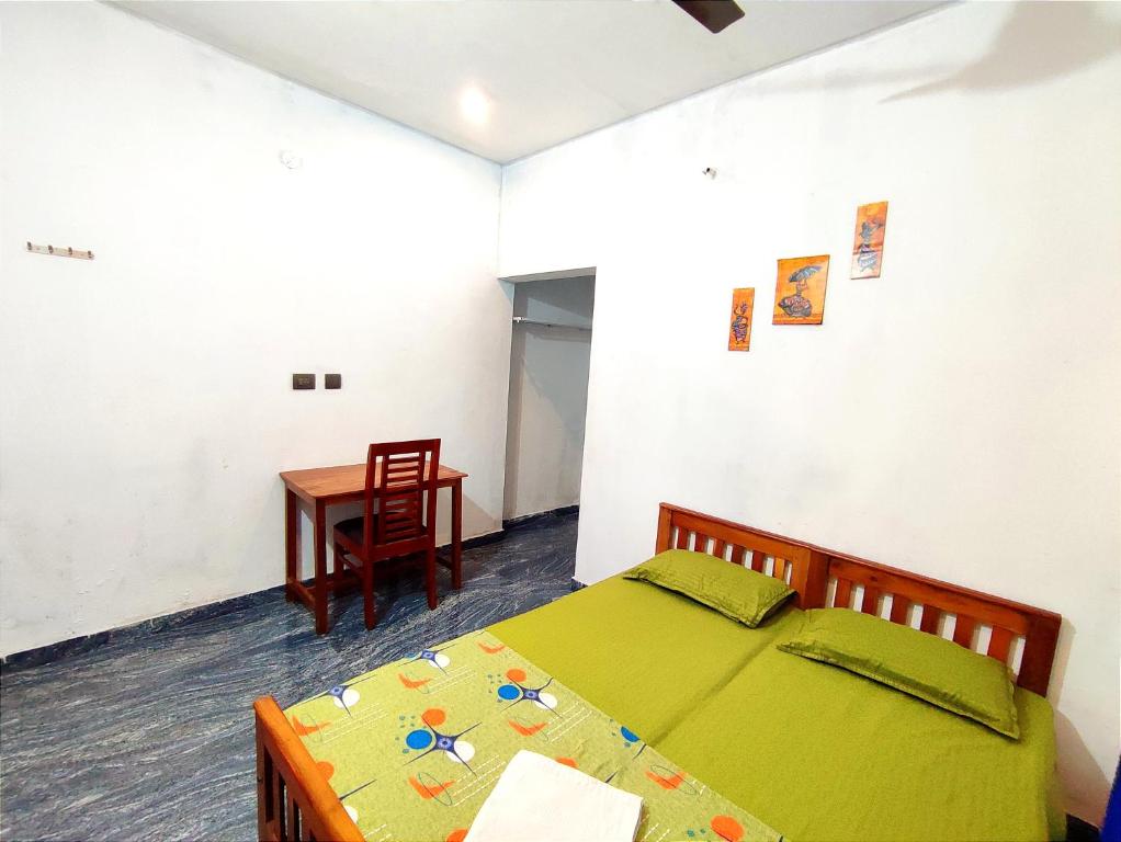 Postel nebo postele na pokoji v ubytování Raelyn's Homestay