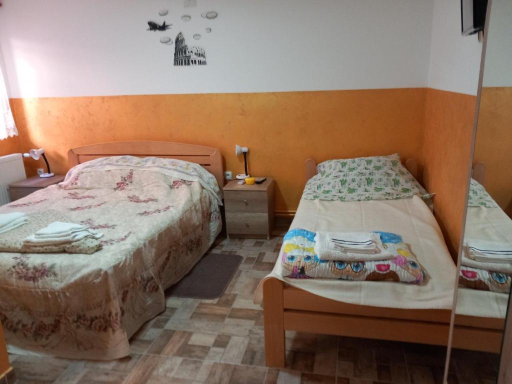 Cama ou camas em um quarto em Sobe Viktorija