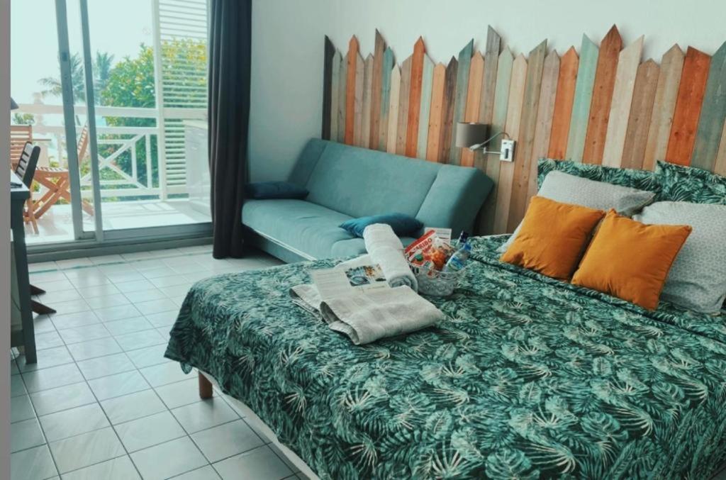 Postel nebo postele na pokoji v ubytování Studio 2/4 personnes avec vue mer & piscine - Résidence Marinotel