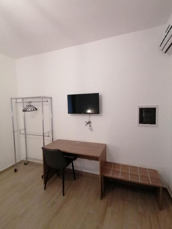 TV a/nebo společenská místnost v ubytování CLASS ROOMS AFFITTACAMERE