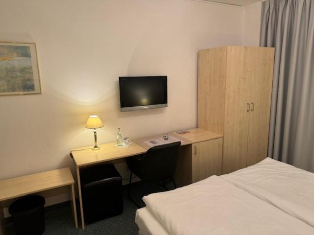 Postel nebo postele na pokoji v ubytování Hotel Occam