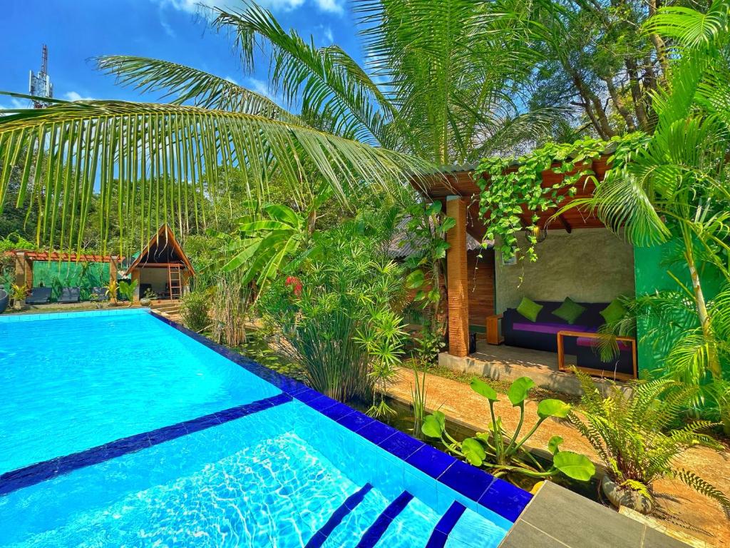 Bazén v ubytování Palmyra Nature Resort Sigiriya nebo v jeho okolí