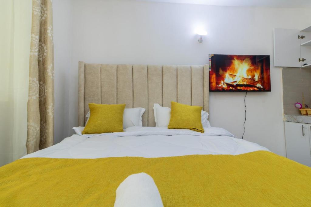 Postel nebo postele na pokoji v ubytování Mombasa Comfy Stay Studio Bamburi