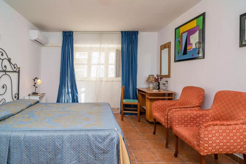 Posteľ alebo postele v izbe v ubytovaní House Stephanotus